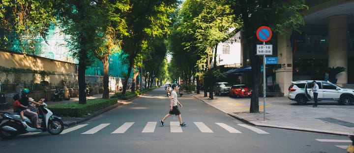 Nickson crossing a crosswalk.